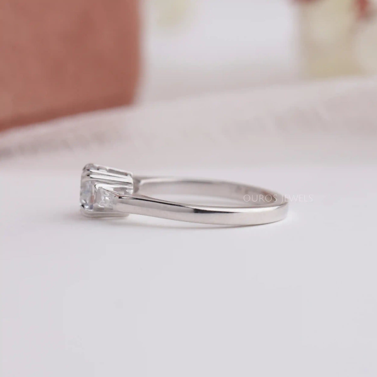 Round and Tapered Baguette Cut Three Stone Engagement Ring Ring