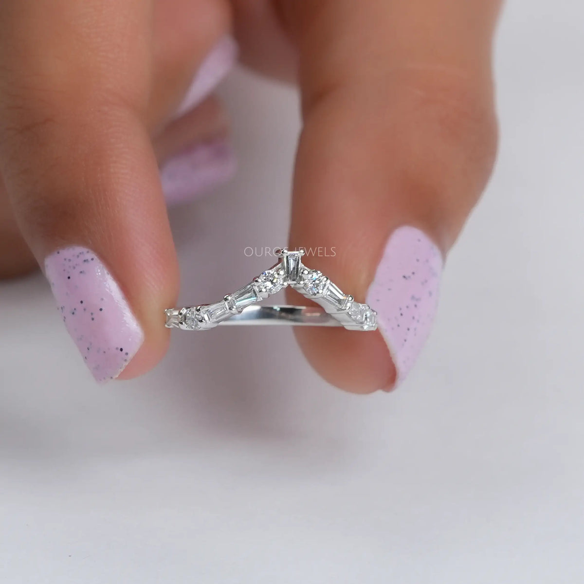 Tapered Baguette and Round Chevron Wedding Band Rings