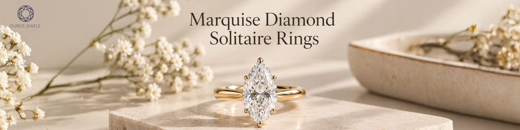 Marquise diamond solitaire rings banner featuring an elongated marquise cut lab grown diamond engagement ring set in a yellow gold prong band