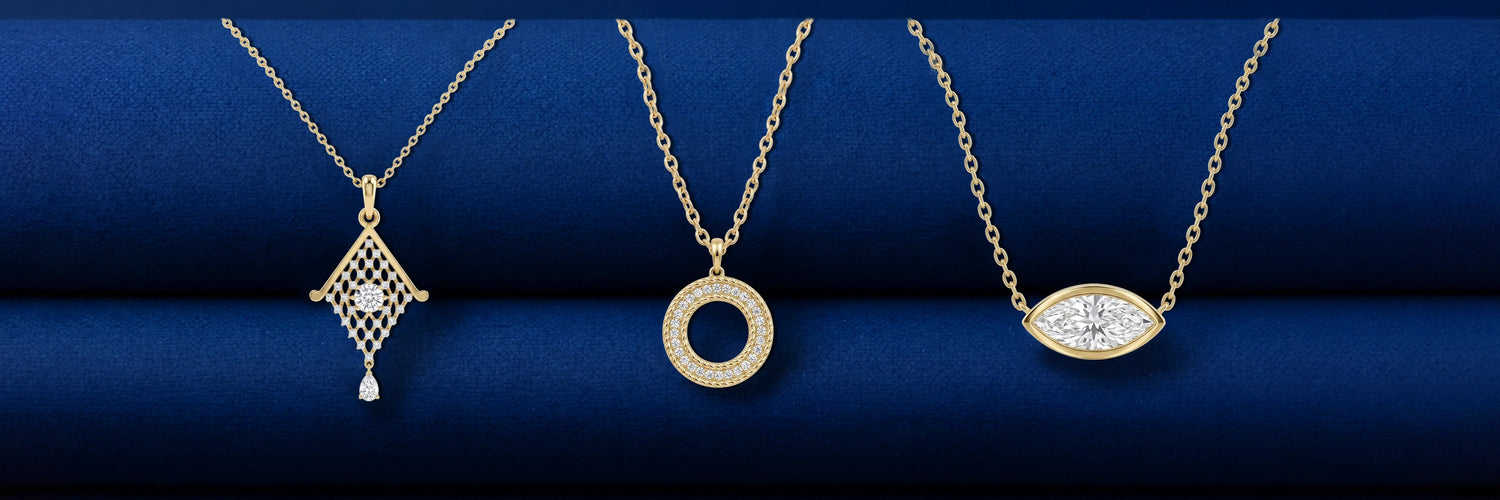 Lab grown diamond pendants for women in yellow gold — geometric kite lattice pendant with pear drop, round pavé open circle pendant, and east-west marquise bezel solitaire necklace on navy blue background