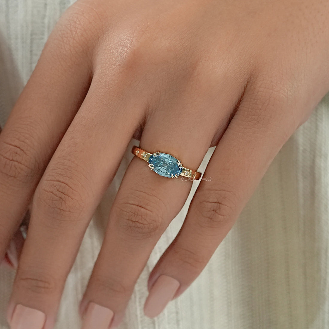 East-West Blue Step Cut Oval Accent Diamond Ring Rings