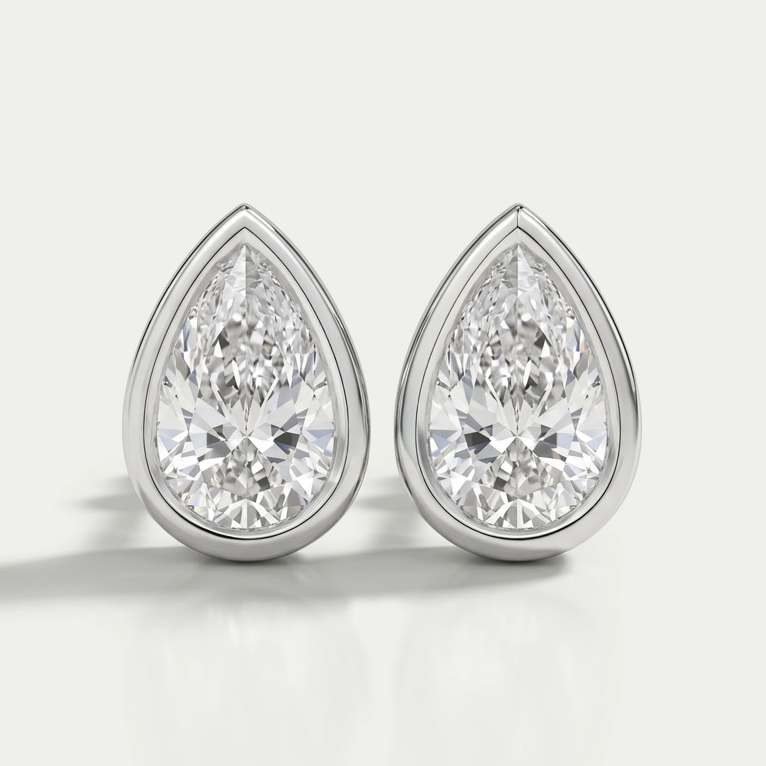 Bezel Set Pear Lab Diamond Stud Earrings Earrings