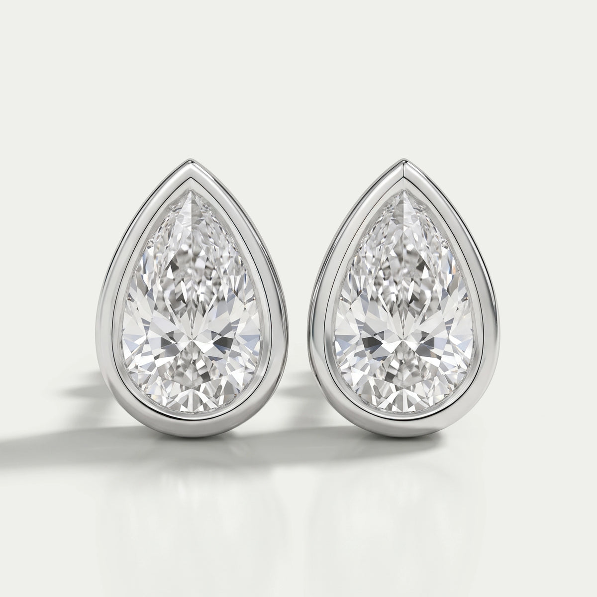 Bezel Set Pear Lab Diamond Stud Earrings Earrings