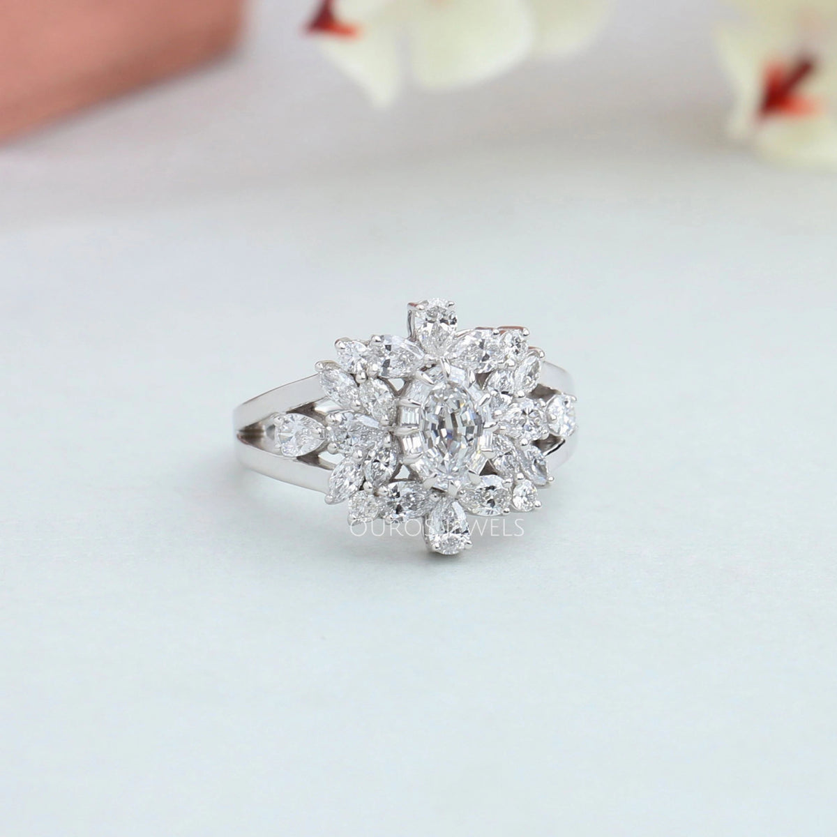 Step Cut Oval Diamond Cluster Engagement Ring