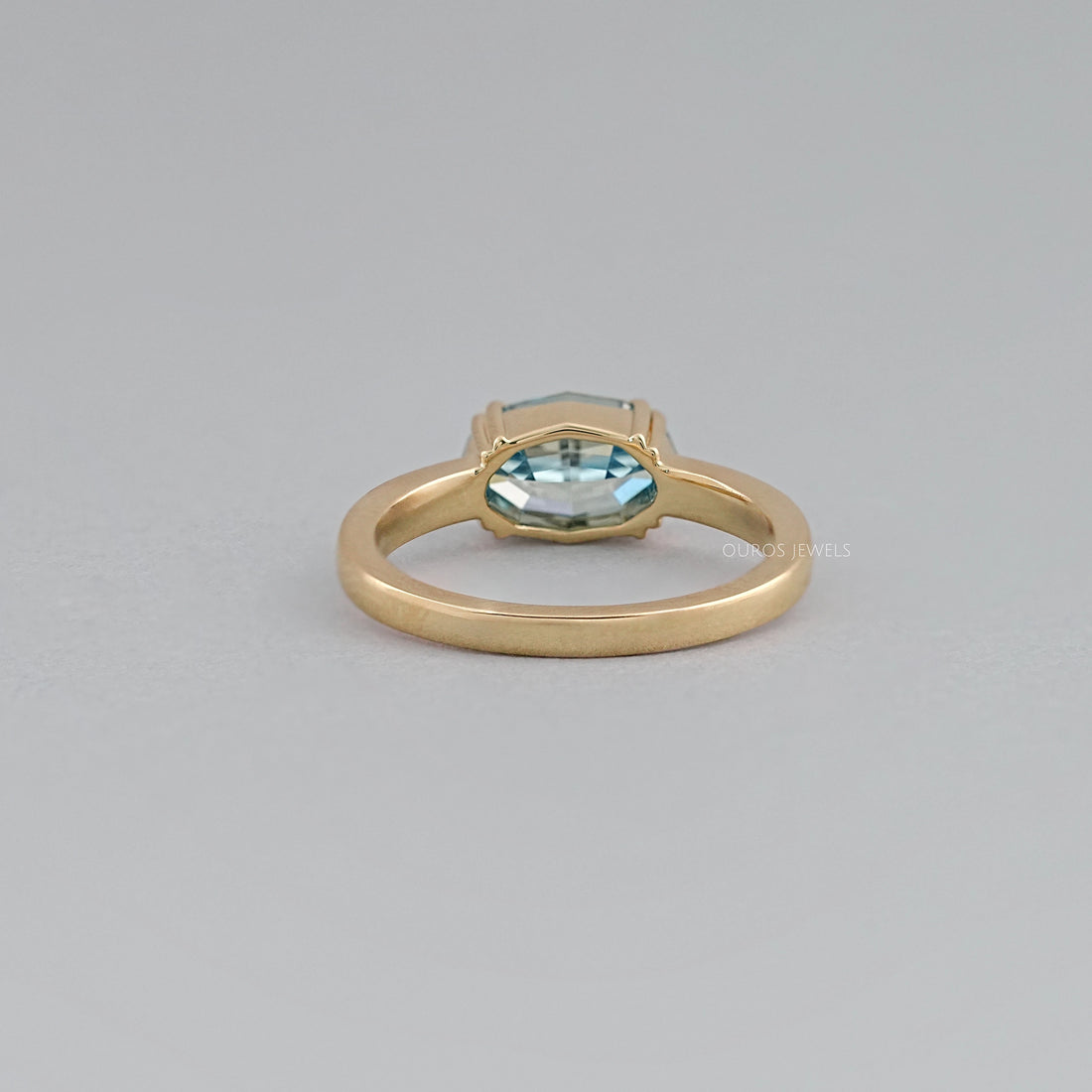East-West Blue Step Cut Oval Accent Diamond Ring Rings
