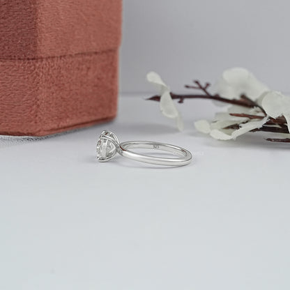 Bezel Set Pear Shaped Diamond Ring