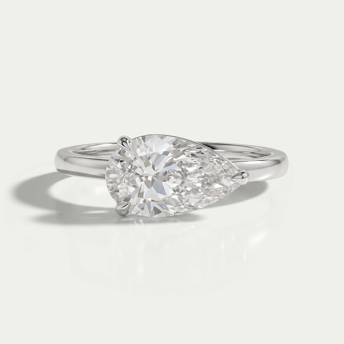 East West Pear Diamond Solitaire Engagement Ring Rings