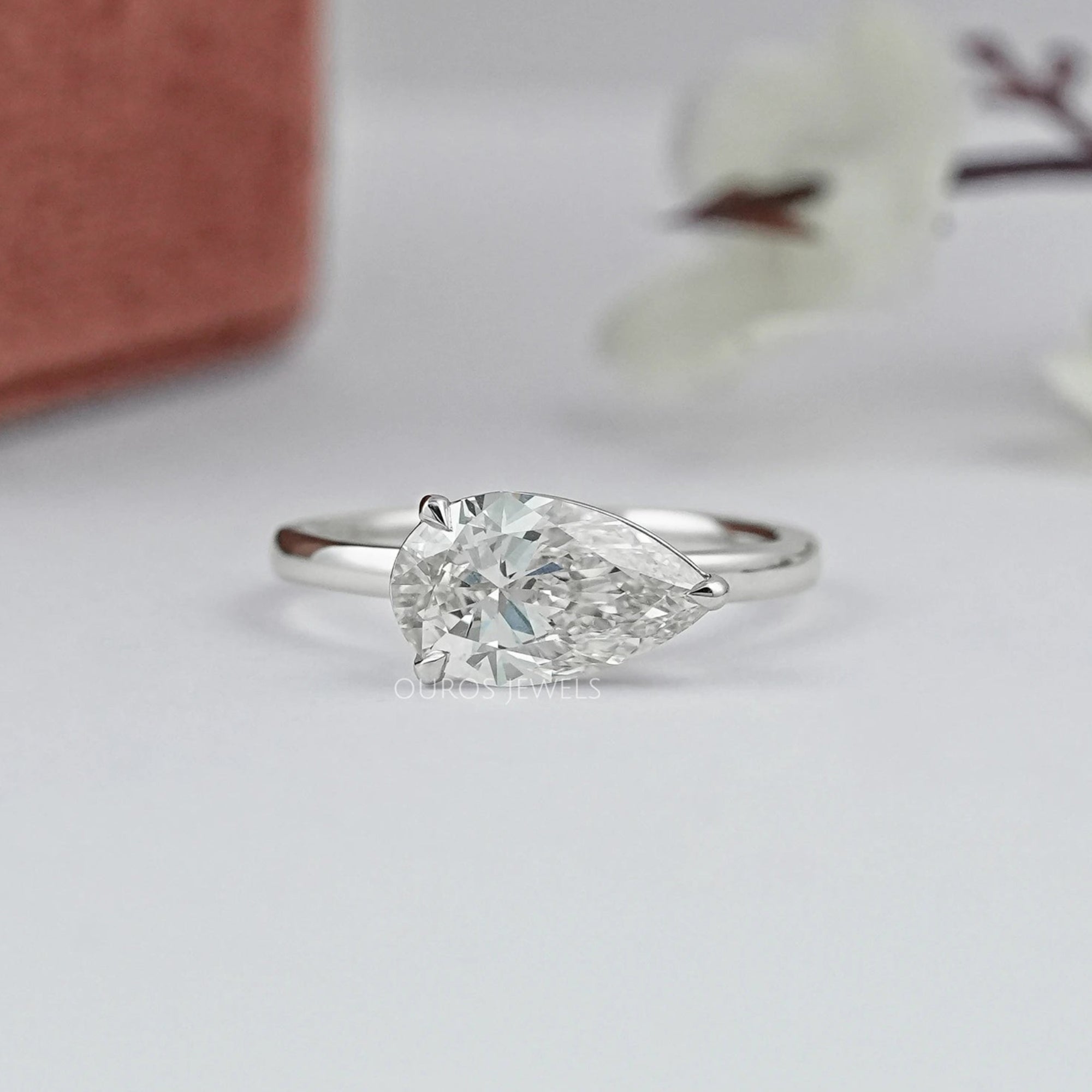 Bezel Set Pear Shaped Diamond Ring