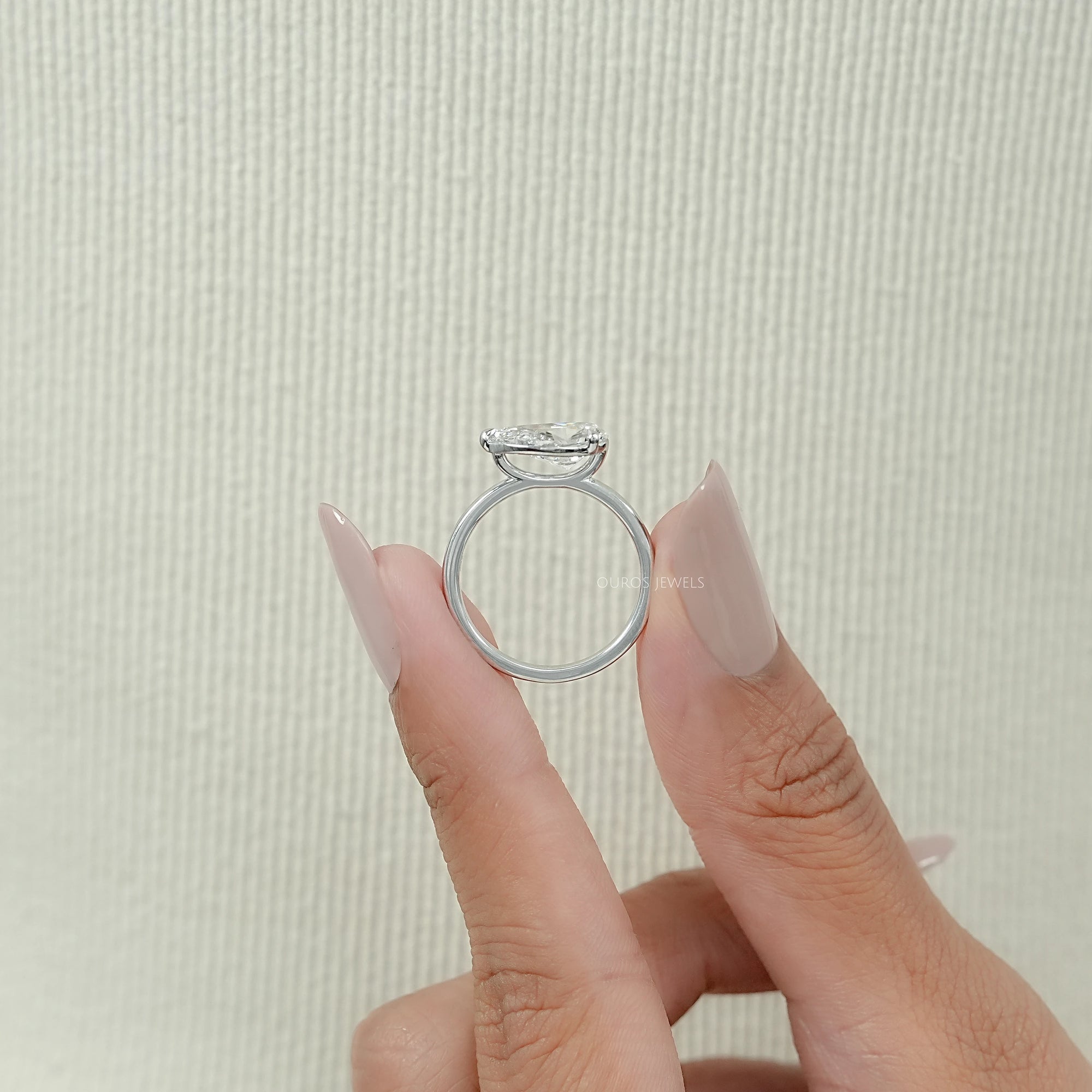 Bezel Set Pear Shaped Diamond Ring