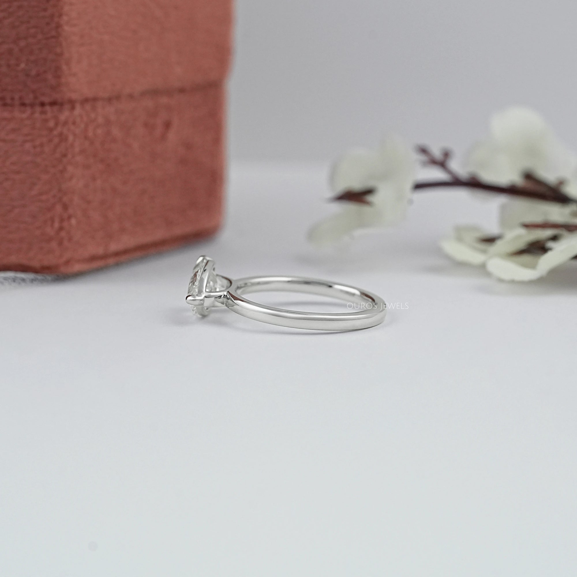 Bezel Set Pear Shaped Diamond Ring