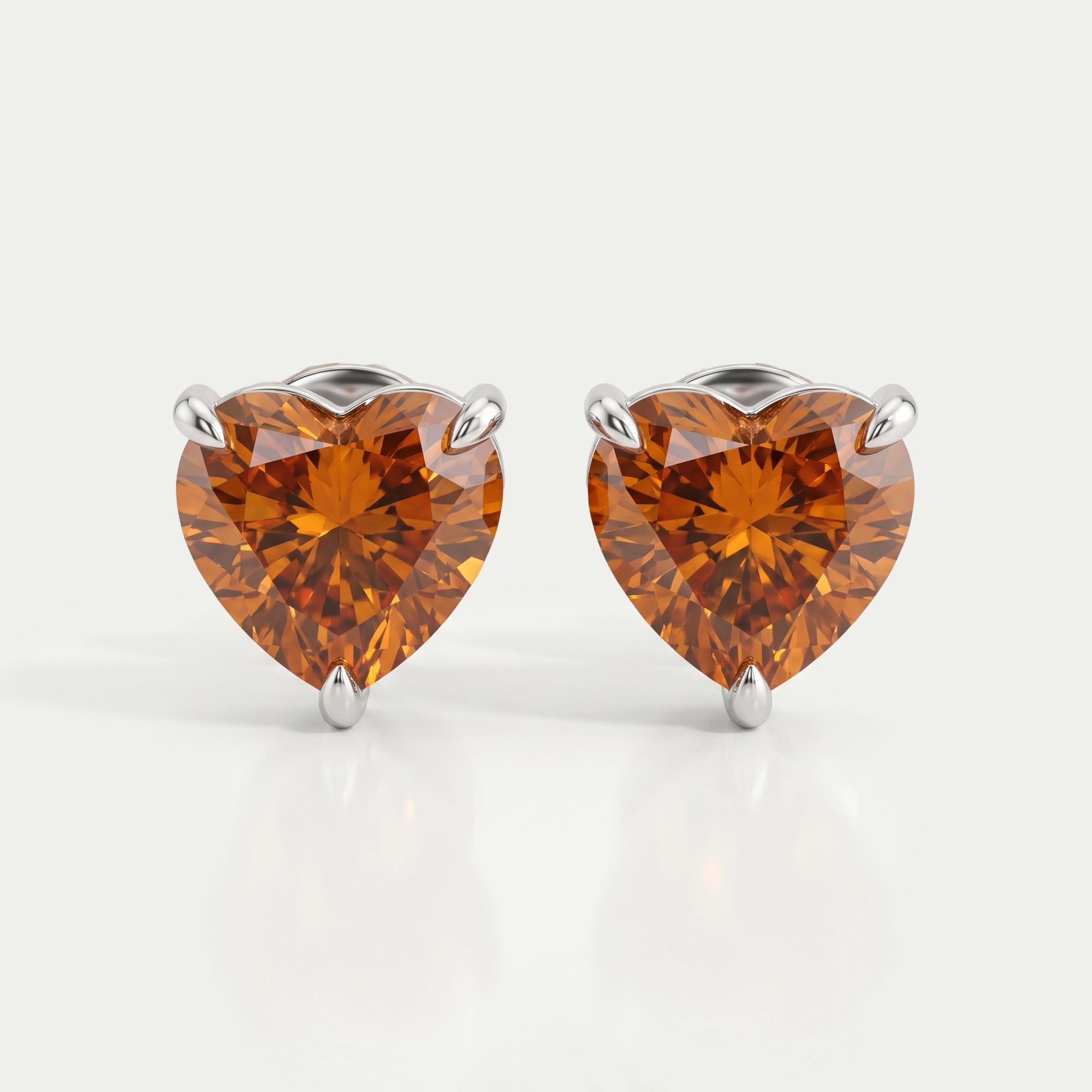 Heart Cut Diamond Solitaire Stud Earrings In Red