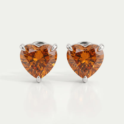 Heart Cut Diamond Solitaire Stud Earrings In Red