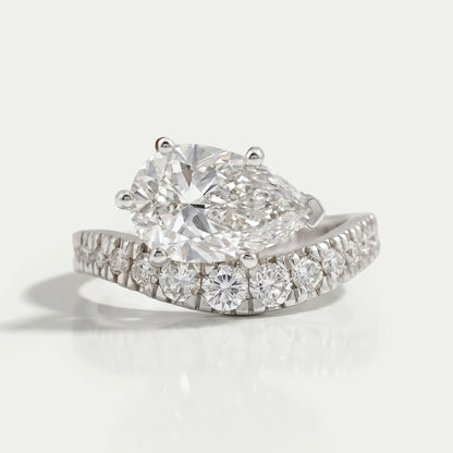 East West Pear Cut Diamond Wave Ring Ring