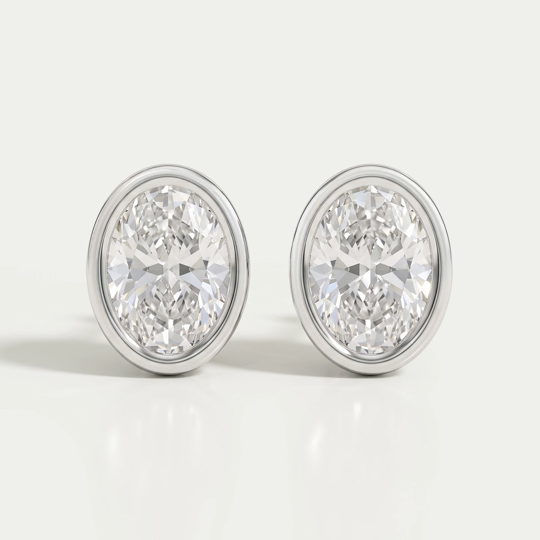 Oval Diamond Bezel Stud Earrings Earrings