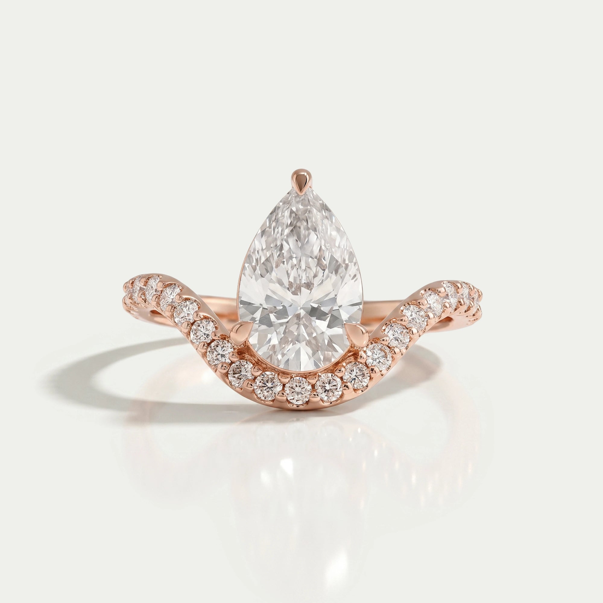 Pear Cut Pave Set Curved Engagement Ring