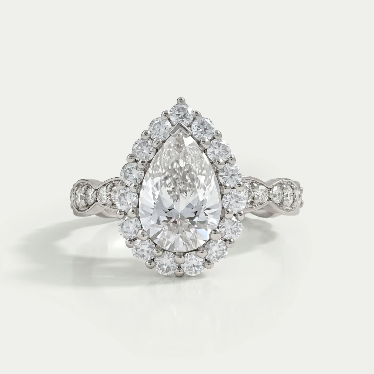Pear Cut Accent Set Halo Engagement Ring Ring