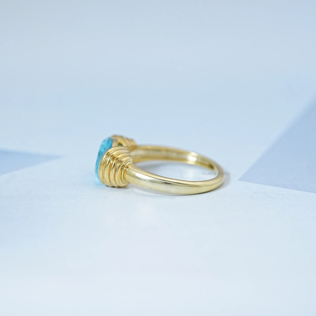 East-West Blue Oval Gemstone Solitaire Ring Rings