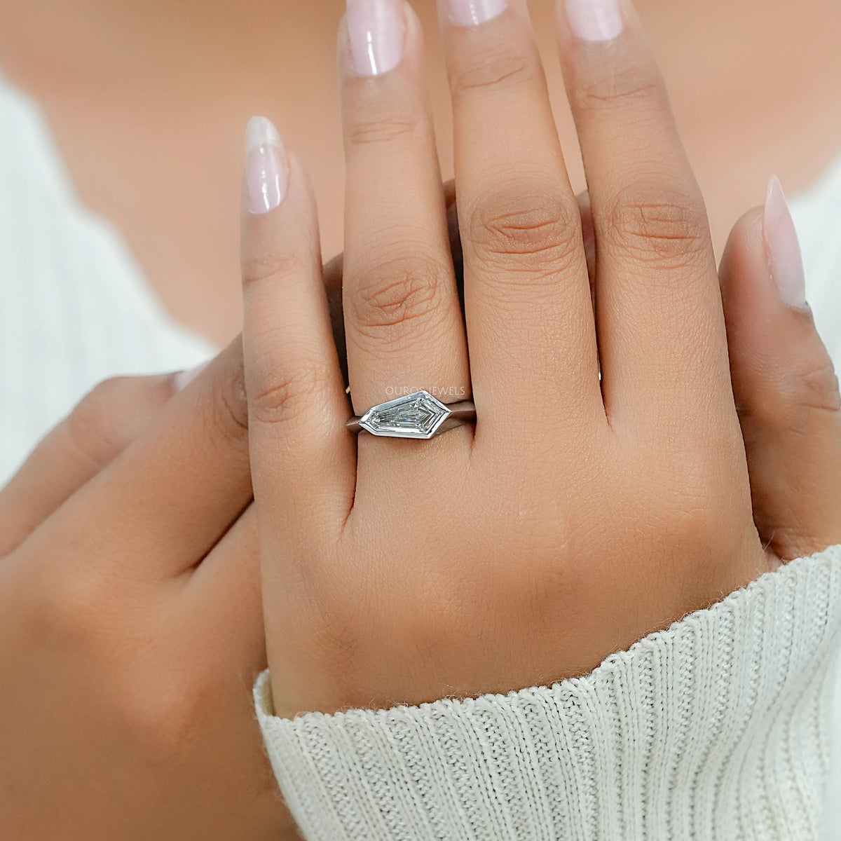 East West Step Cut Shield Bezel Set Solitaire Ring