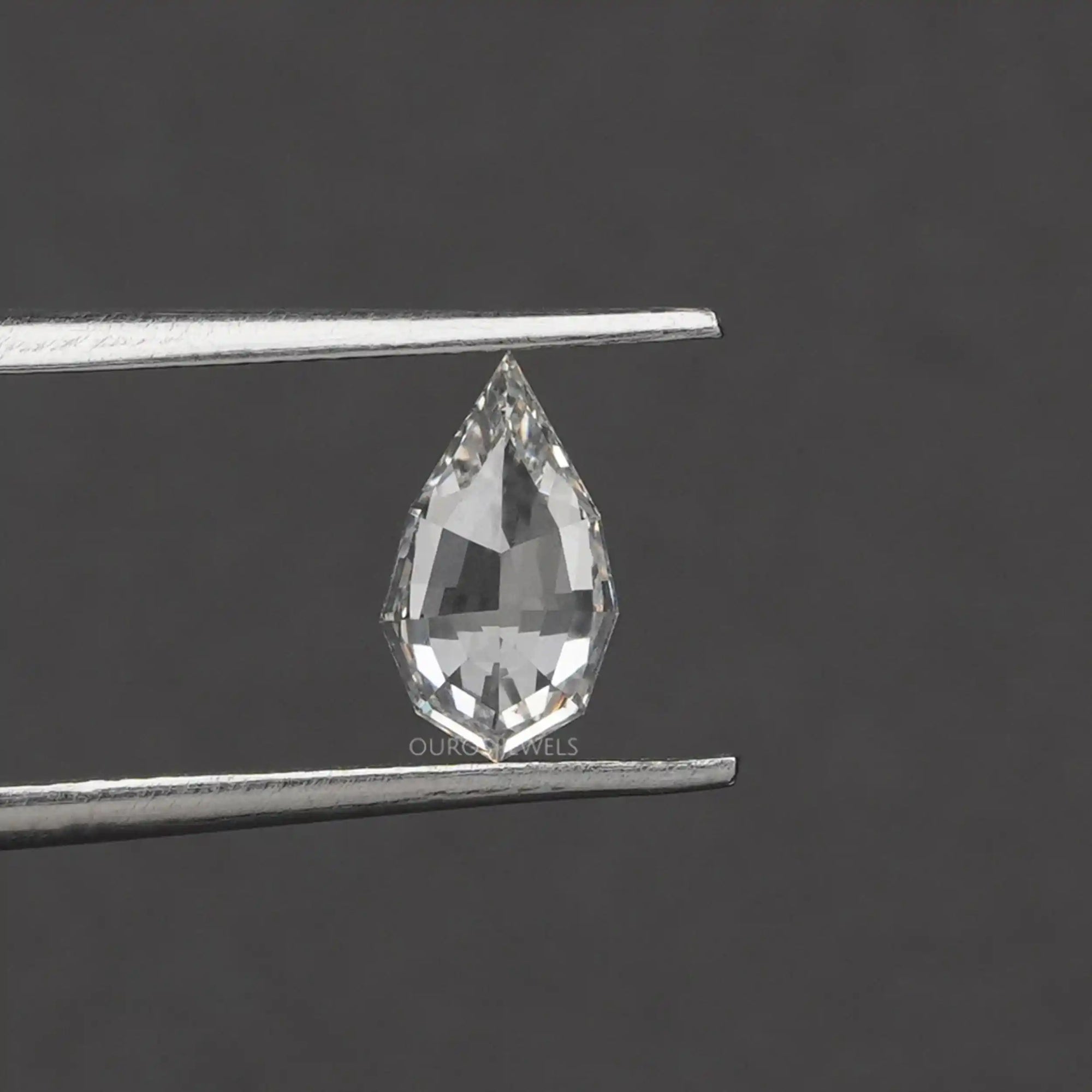 4.15 TCW Step Cut Pear And Kite Diamond Loose Pair