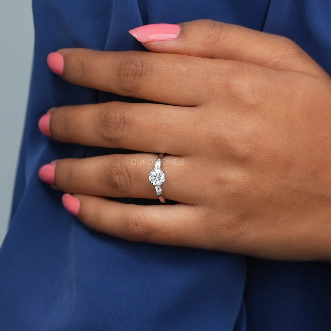 Round and Tapered Baguette Cut Three Stone Engagement Ring Ring