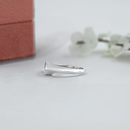East West Step Cut Shield Bezel Set Solitaire Ring
