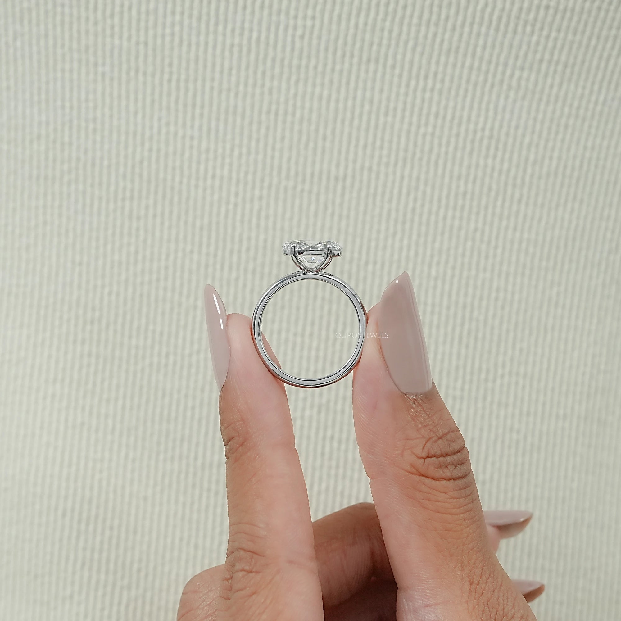 Bezel Set Pear Shaped Diamond Ring